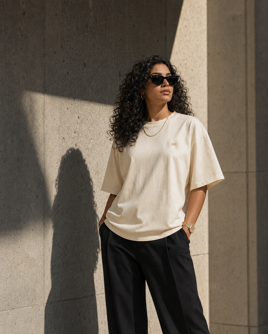 Latina model wearing the cream heavyweight Drop 001 tee